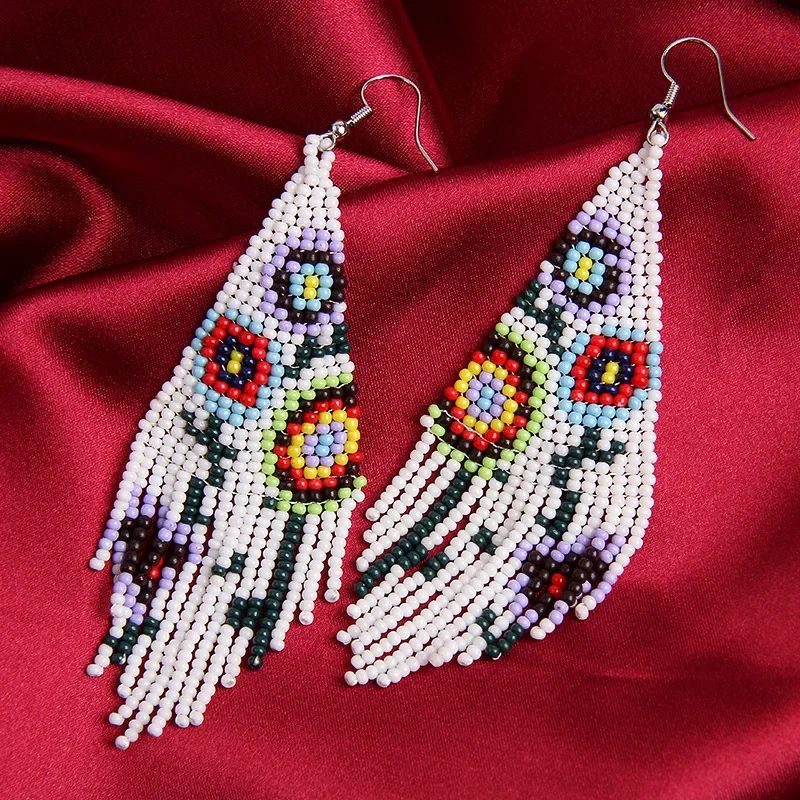 

Fringe Earrings Hand knitting Bohemia Beading flower fashion fresh alloy geometry ma'am Rice Bead Earrings