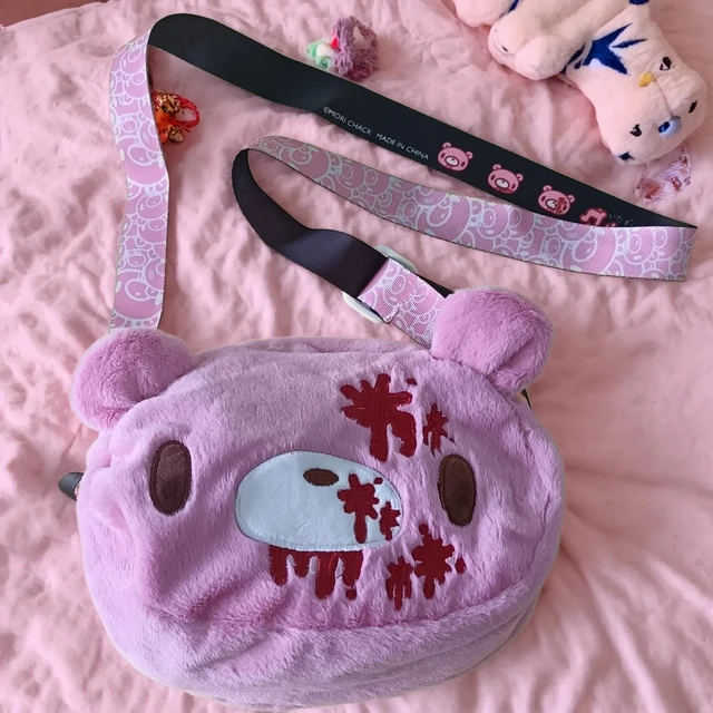 Gloomy Bear plush crossbody bag: Pink, cute - edgy with “blood - splatter” details. A fun, unique pick for fans. 1