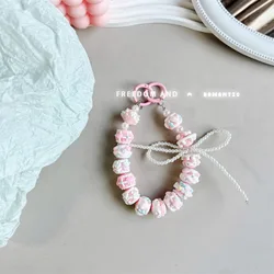Colorful Hand - Painted Pearl Bowknot Beaded Phone Charm Strap (Pink)