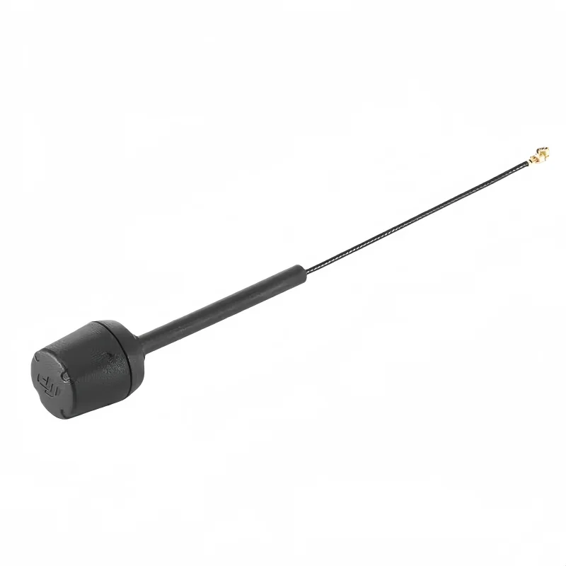 Antenne DJI O4 Pro omnidirectionnelle posée sur une surface, câble flexible visible