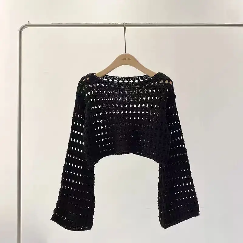 Spring and summer new French short long-sleeved hollow knitted sweater women's design sense thin sunscreen blouse top