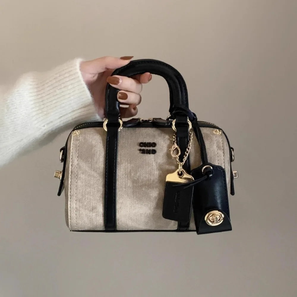 Nanfeng Chio2nd internet celebrity semi cooked mocha pillow bag women's new handheld small handbag shoulder crossbody bag