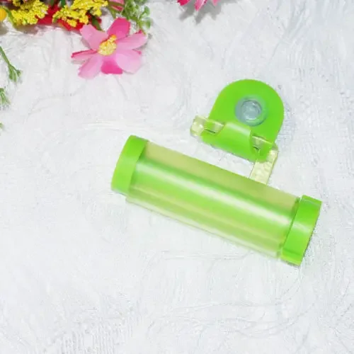 1 PCS Creative Rolling Squeezer Toothpaste Dispenser Tube Partner Sucker Hanging Holde distributeur dentifrice