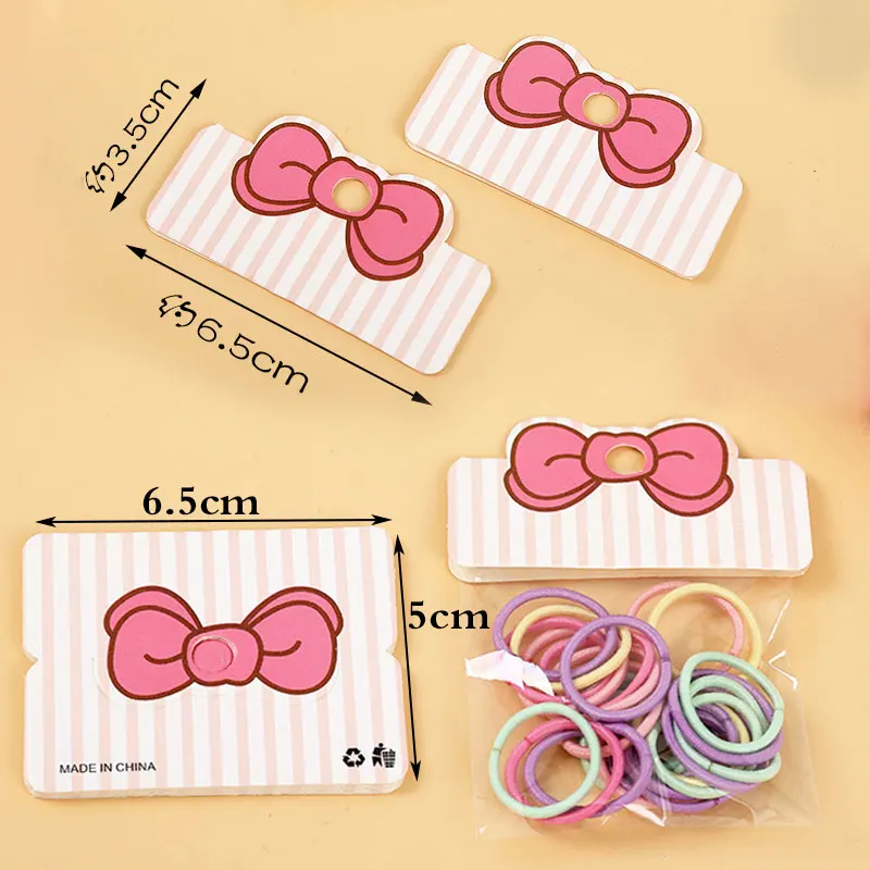 50pcs/lot Foldable Packaging Paper Cards with OPP Bags for Handmade Jewelry Retail Hang Tag Bow-knot Pattern Display Cardboard