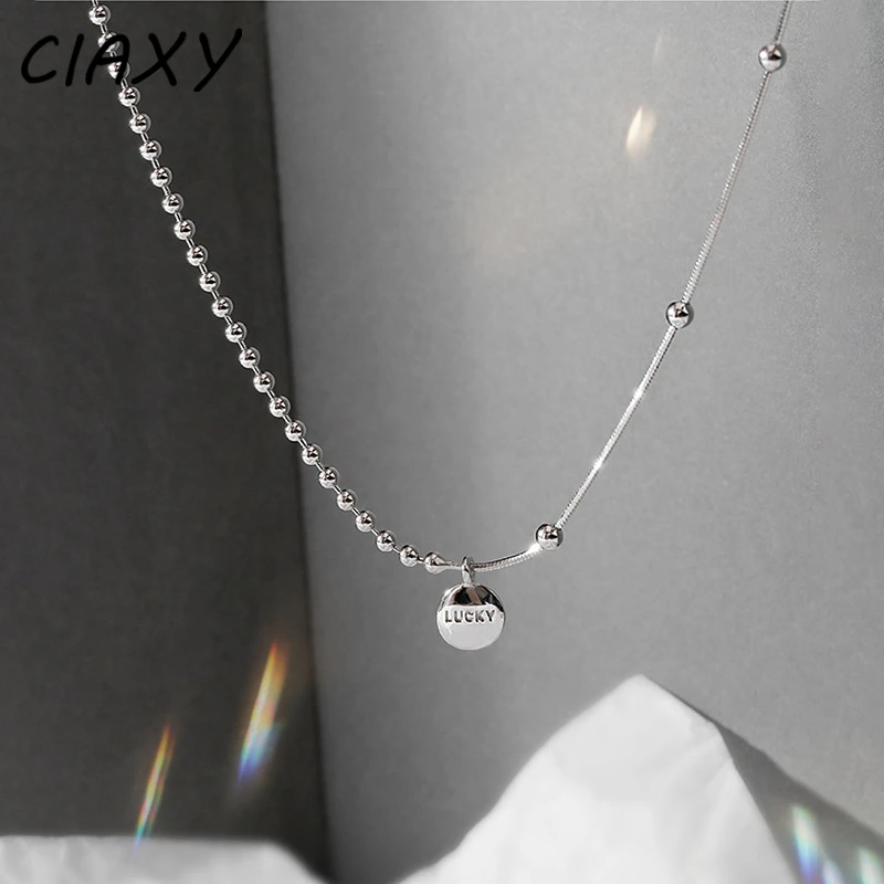 CIAXY – bonnet porte-bonheur couleur argent pour femmes, collier avec lettres asymétriques, chaîne de clavicule courte, ras du cou, bijoux de tempérament, cadeau 1 CIAXY – bonnet porte-bonheur couleur argent pour femmes, collier avec lettres asymétriques, chaîne de clavicule courte, ras du cou, bijoux de tempérament, cadeau 1