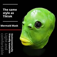 Маска с головой зеленой рыбы, игрушка, скульптура из песка, игра в странную крышку головы зеленой рыбы — изображение 2