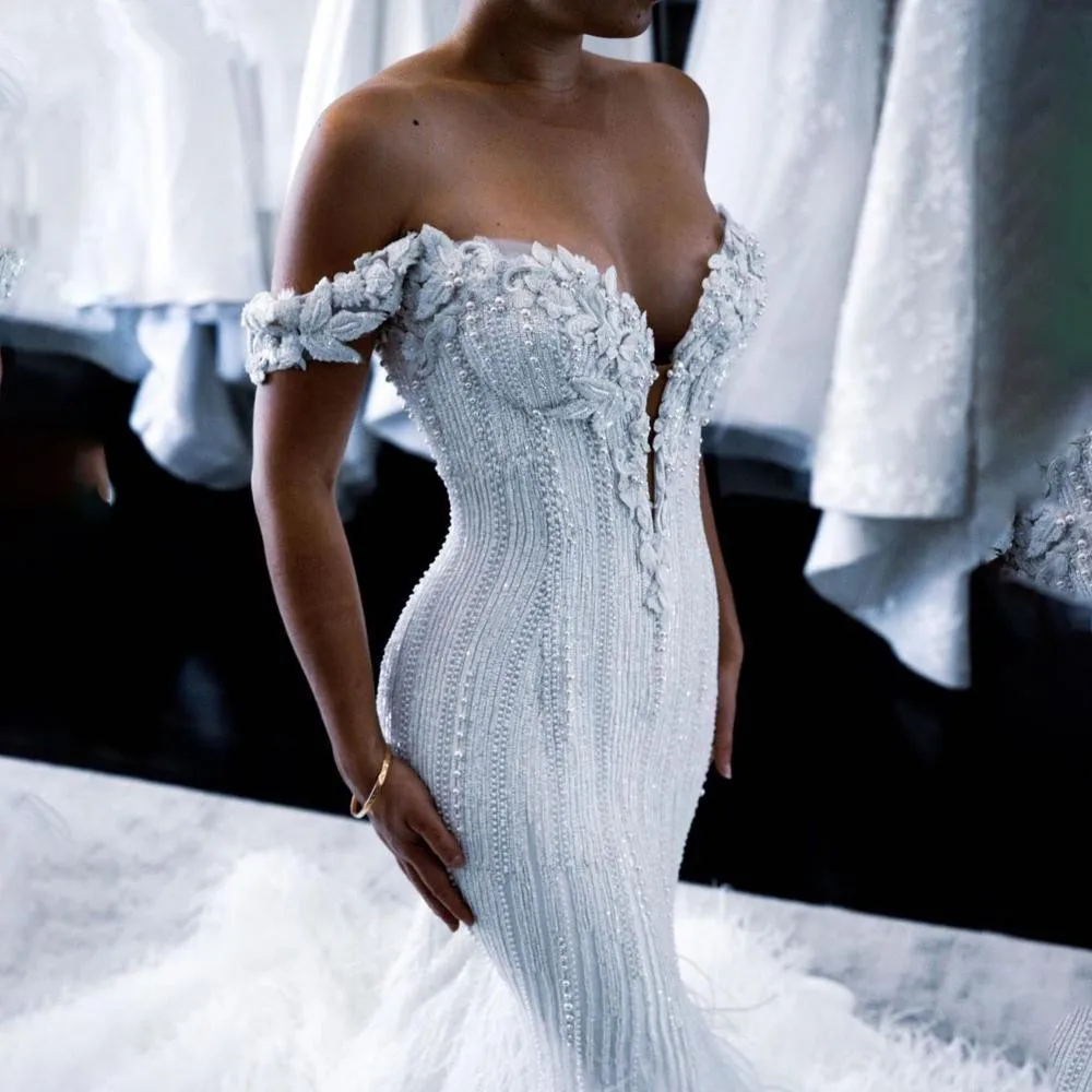 Mermaid Wedding Dresses Off Shoulder Pearls Beading Appliqued Sweep Train Wedding Gowns Feathers