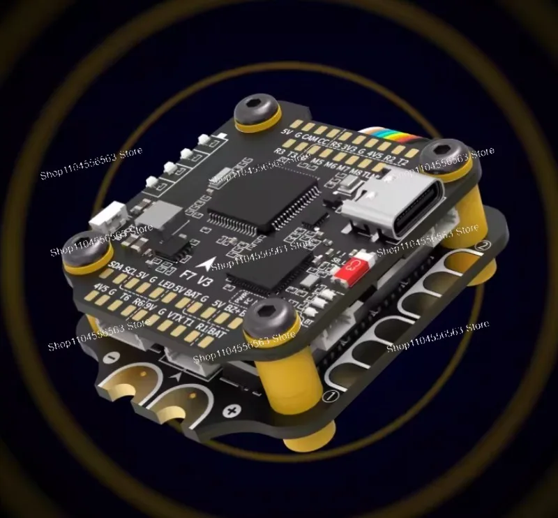 Vue de dessus du SB-STACK-F7V3-50 50A avec dissipateurs en or, argent et brun pour FPV.