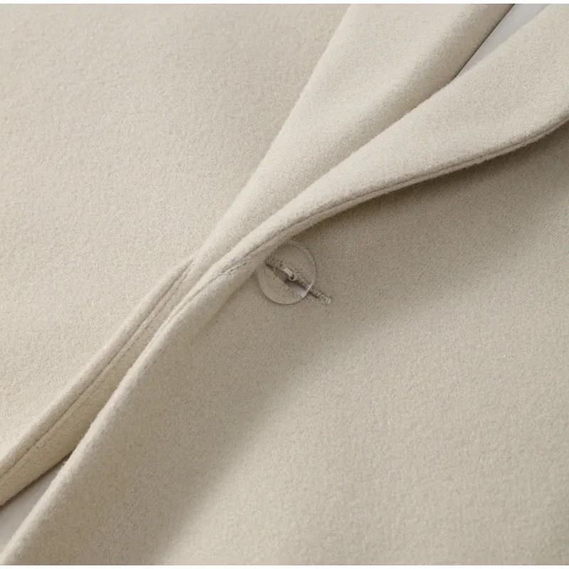 Abrigo largo de lana con borlas para mujer, chaqueta holgada de manga larga con solapa y botonadura sencilla, color marrón, primavera 2025
