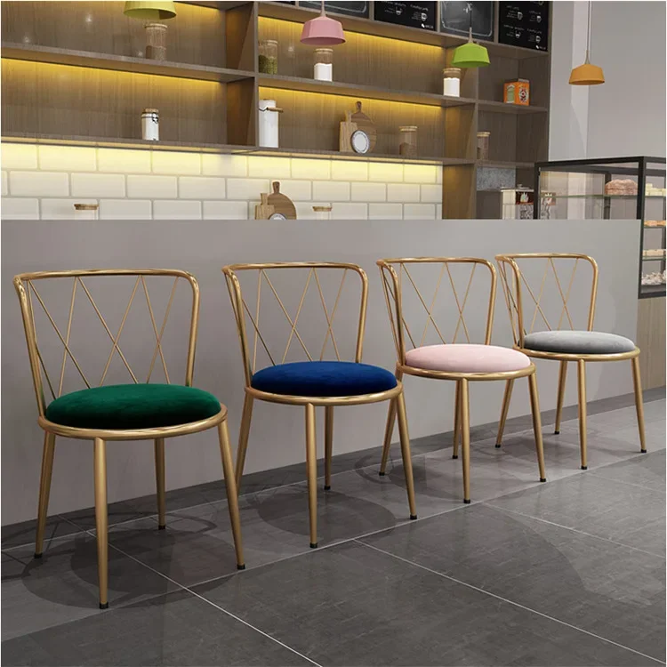pink velvet fabric chair with gold legs and round table with marble top coffee shop furniture chairs and tables