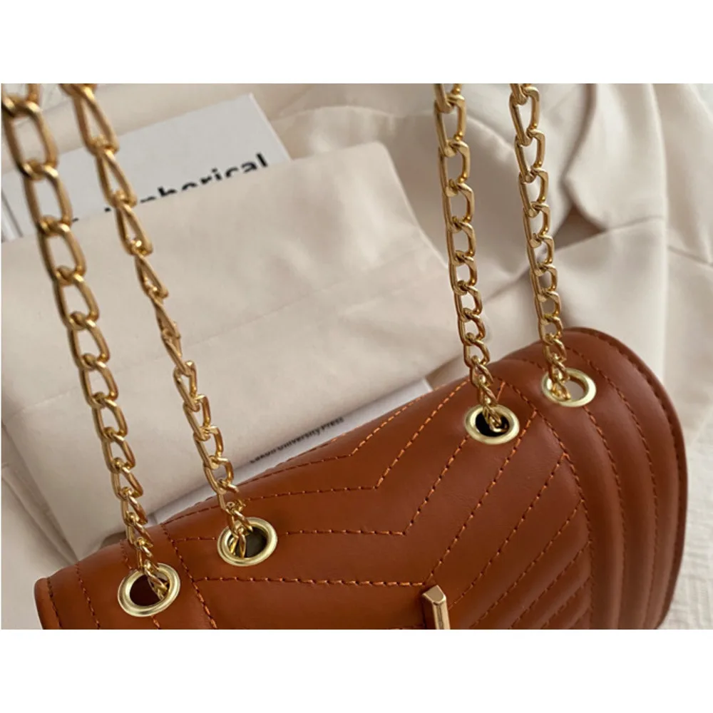 Borsa a tracolla donna con ricamo catena e nappine elegante_voghion.com