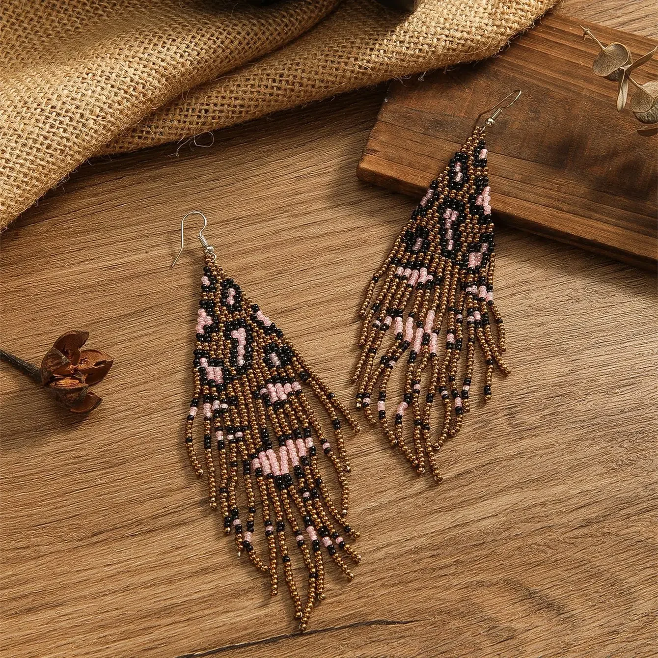 

Rice bead earrings Hand woven Retro Leopard print Beading Simplicity Bohemia geometry alloy ma'am Fringed earrings