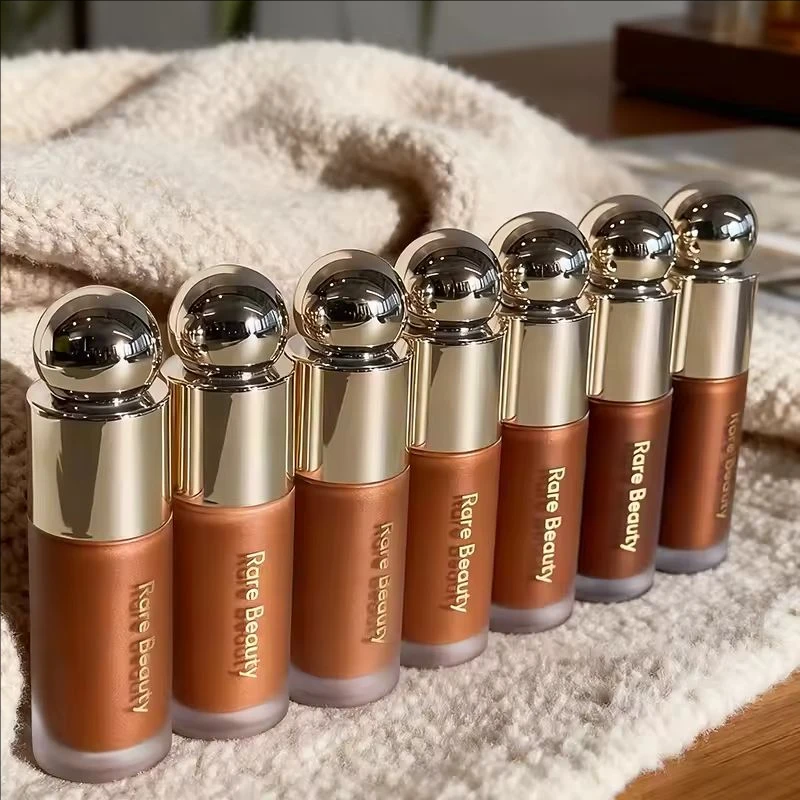 Set rare beauty highlighter liquido e luminizer per viso_voghion.com