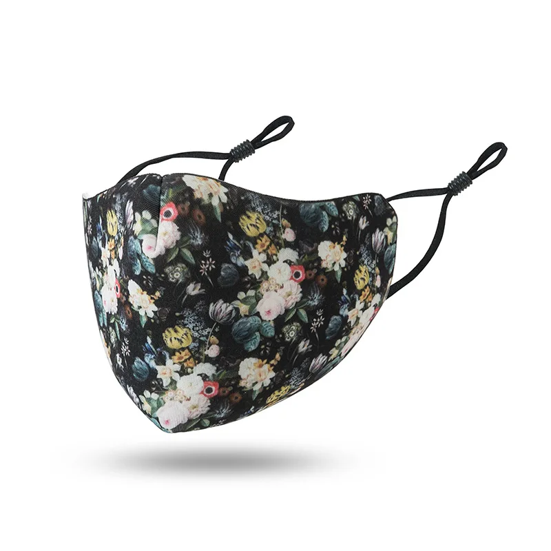 Vue de face du masque réutilisable en tissu 3 couches, avec coutures visibles et tissu respirant, idéal pour acheter un masque réutilisable.
