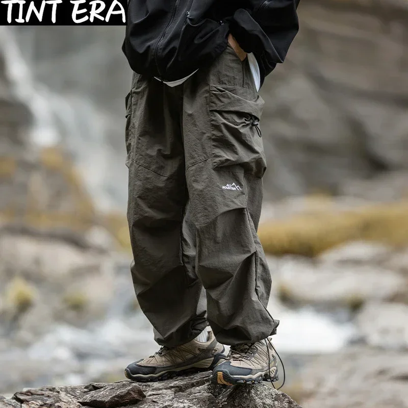 

TINT ERA Parachute Cargo Pants Men Oversize Outdoor Casual Trousers Male Waterproof Pants Man Japanese Streetwear Hip Hop