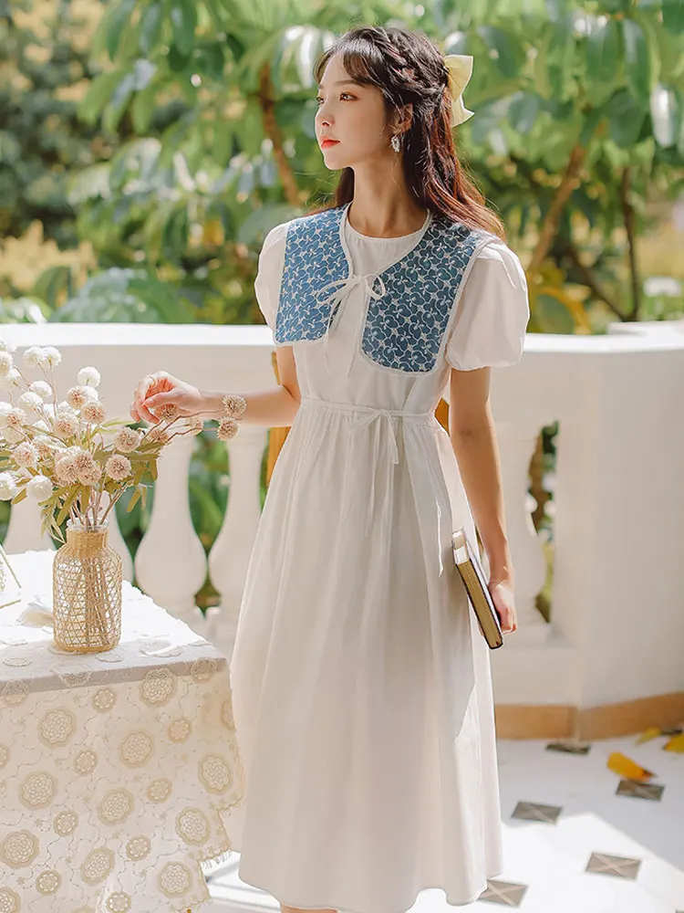

Summer new women's dress Korean academy style girl doll collar loose dress bubble sleeve white long dress