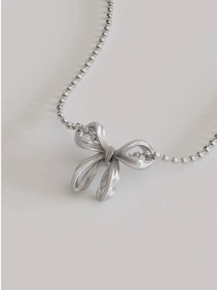 Silver Cylinder-shaped Beaded Chain with Butterfly Bowkont Charm Pendant