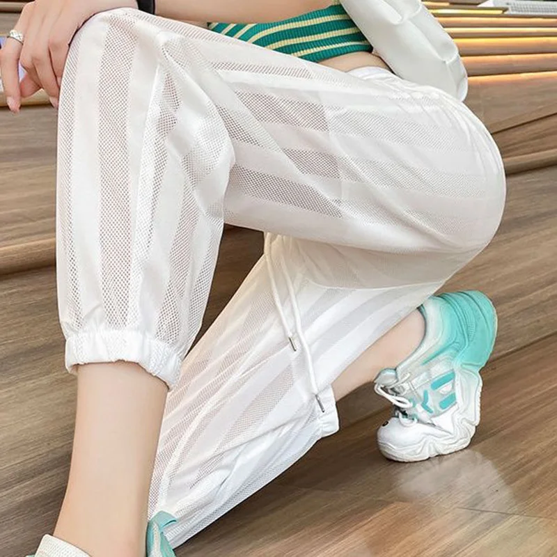 Fashion Loose Elastic High Waist Shirring Bandage Hollow Out Pants Female 2023 New Commute All-match Solid Color Casual Capris