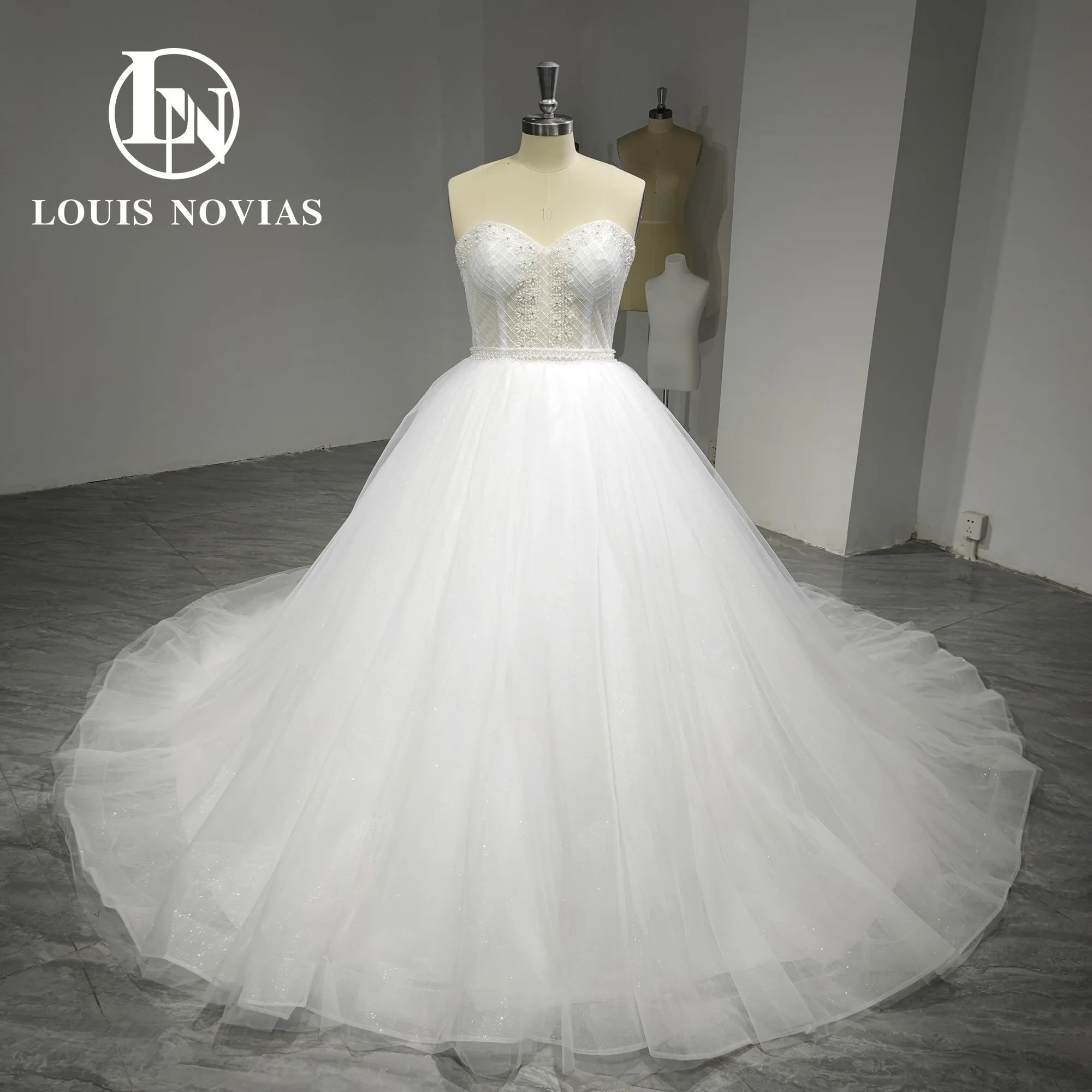 

Женское ТРАПЕЦИЕВИДНОЕ свадебное платье LOUIS NOVIAS, зеленое платье без бретелек с бисером, лето 2019