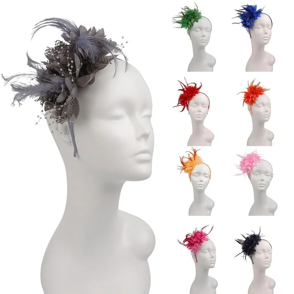Grande fascinator con fiocco e piume in verde giada per gli invitati al