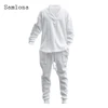 Mens Casual Knitting Two Piece Sets 2023 New Winter Fashion Irregular Top Sweater and Solid White Sweatpants Male Tracksuits Set 4