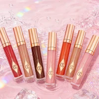 Ensemble de maquillage Charlotte Tilbury CT, hydratant pour les lèvres au collagène Water Light, poudre pressée pour un fini impeccable, fard à paupières quatre couleurs 6