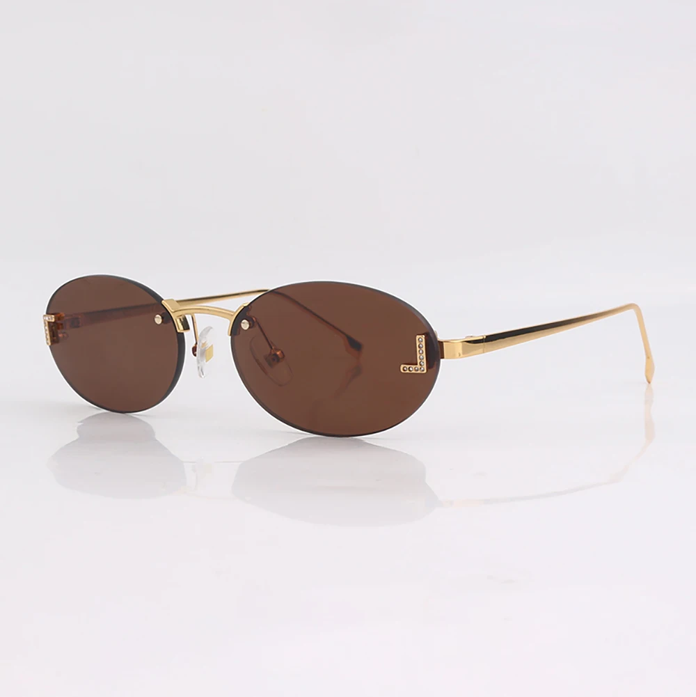 Gold metal frame Men's and women's sunglasses Fashion Rimless Oval cat eye sunglasses for Unisex Outdoor UV protective_voghion.com
