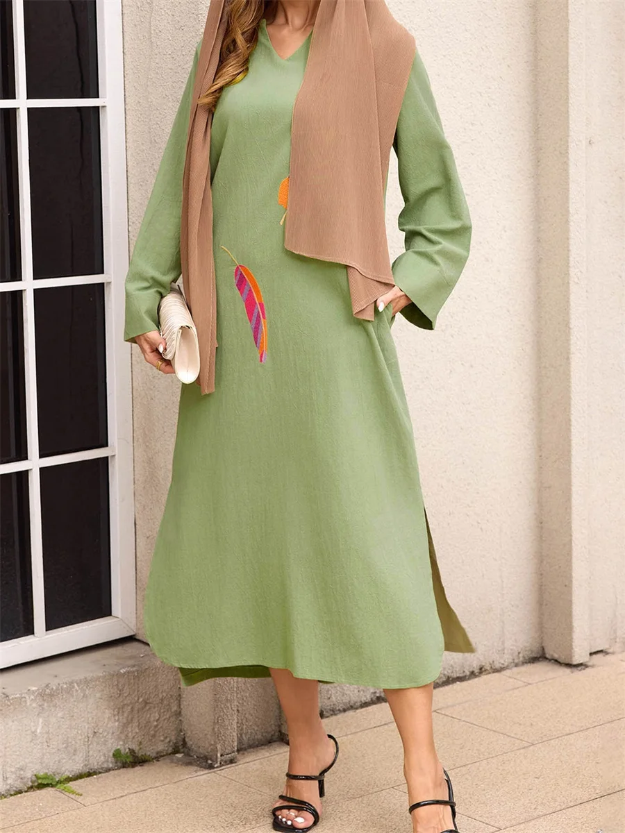 Elegant Middle Eastern Inspired Women s Long Dress with Feather Print Loose Fit V Neck and Long Sleeves for a Stylish Look