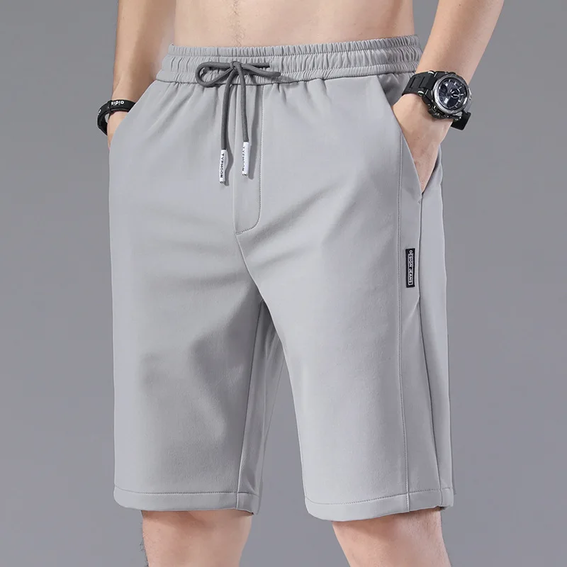 Pantalones cortos deportivos elásticos para hombre, pantalón corto informal para correr en la playa y al aire libre, a la moda, M-5XL