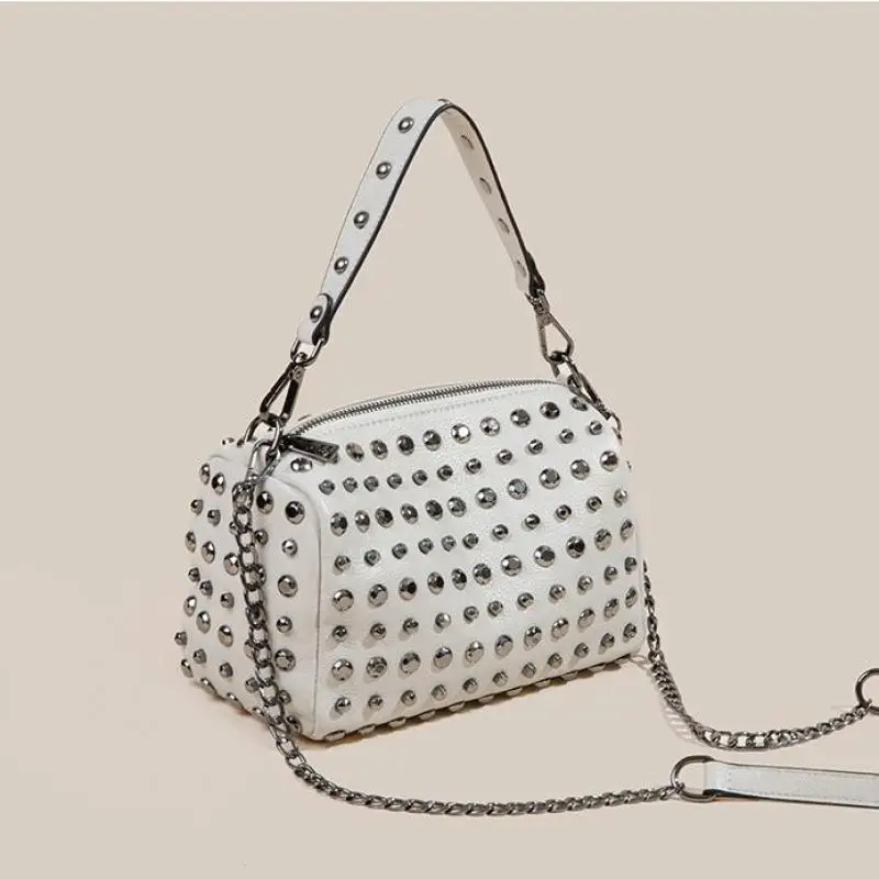 

2024 Fashion Pillow Shaped Handbag Female Metal Rivets Decorated High Quality Head Layer Cowhide Cylindrical Shoulder Bag Female