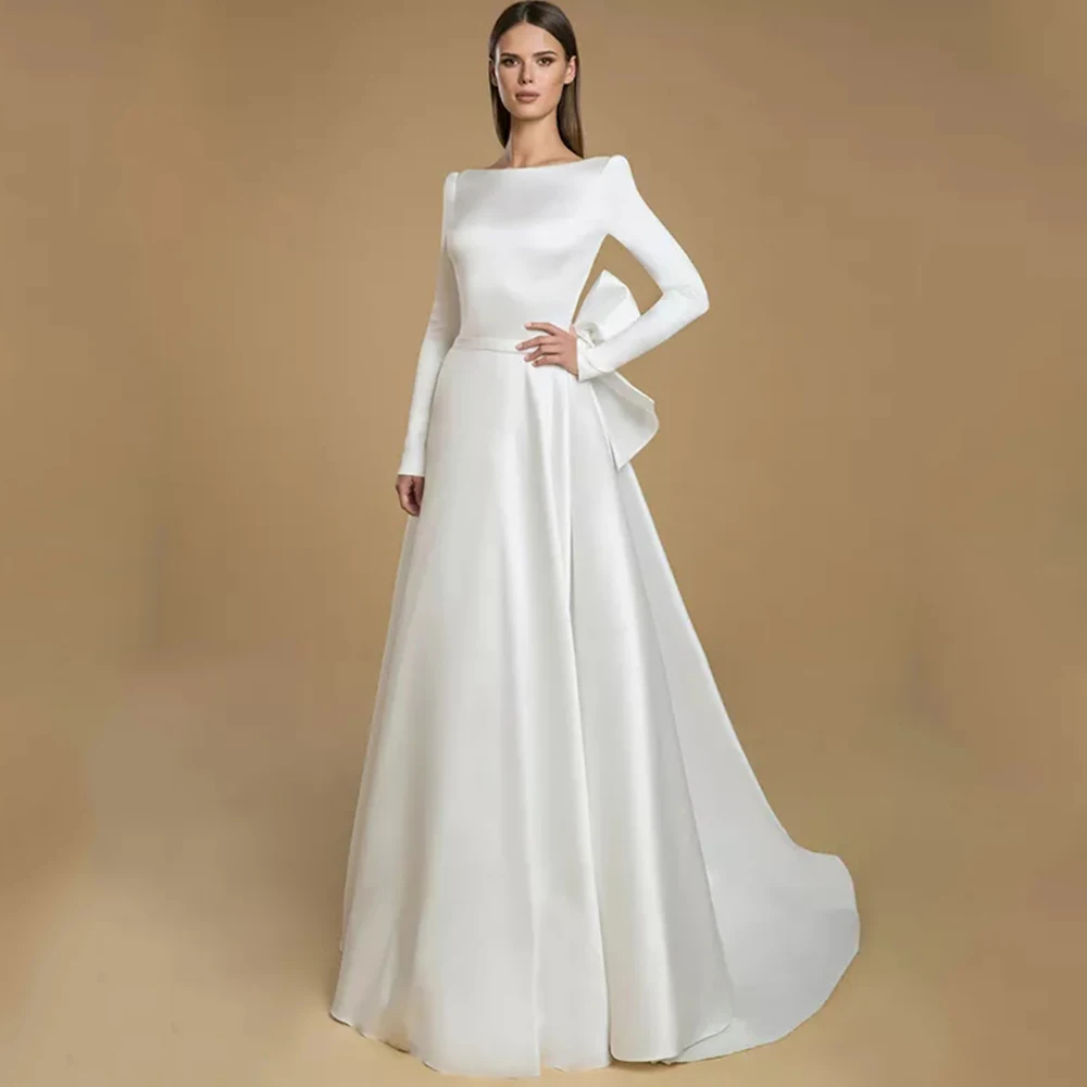 

Simple Boat Neck Long Sleeve Wedding Dress Satin A-Line with Belt Floor Length Sexy Open Back Bow and Buttons Bridal Gowns