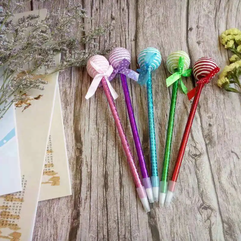 

Wholesale cute cartoon stationery, fashion cute bow, plastic lollipop colored ballpoint pen, prize pen