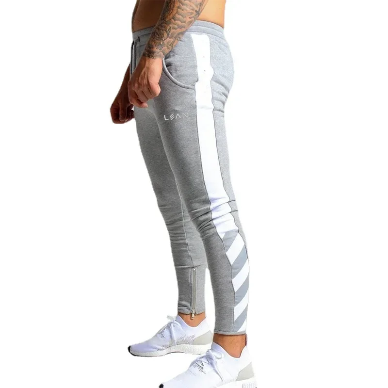 Men's Muscle Fitness Casual Sports Running Training Pants Autumn/Winter Small Footwear One Piece Agent