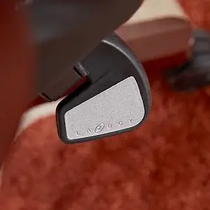 Height adjustment lever under the seat