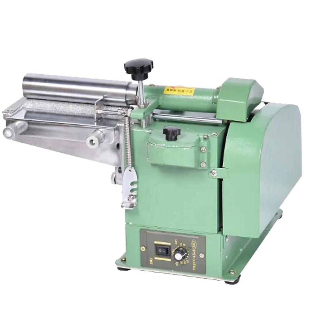 

Роликовая машина для склеивания кожи настольного типа