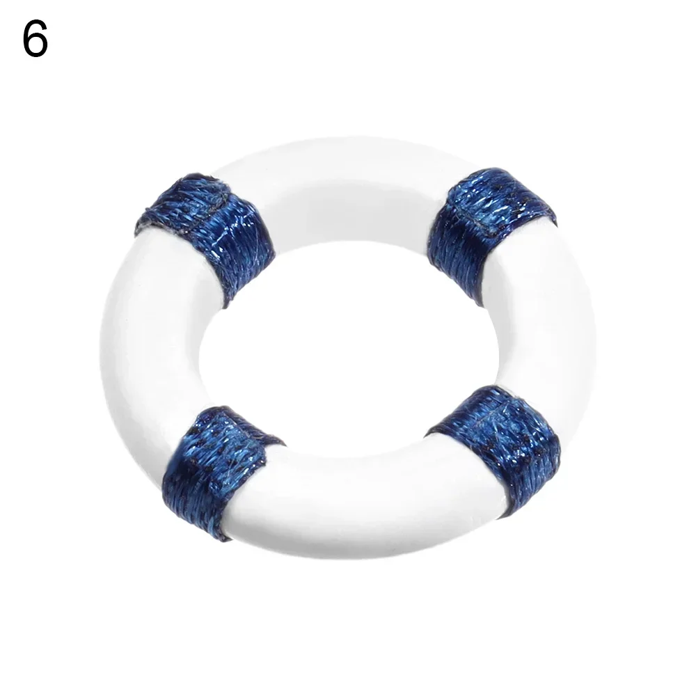 Miniature Boat and Paddle Figurine - Decorative Resin Craft