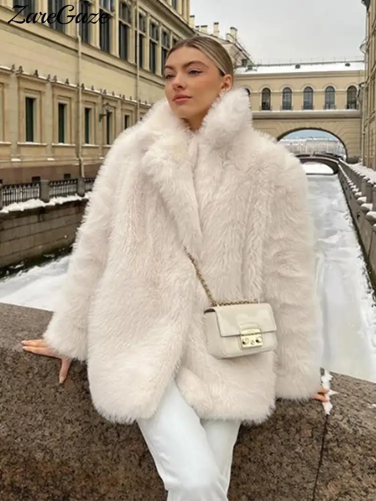 314619-17d650.jpg S425231f91331465088dd957af95f554dK Winter Fluffy Furry Faux Fur Long Jacket Coat Women Loose Lapel Long Sleeve Thick Warm Coats Female Luxury Fashion Lady Overcoat Mallzona