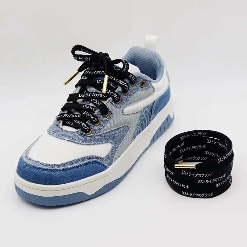 Lacets avec lettres japonaises imprimées noires et blanches