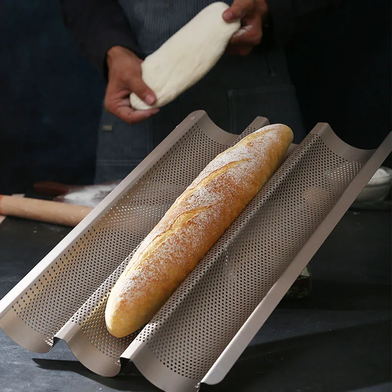 https://ae01.alicdn.com/kf/S4271a2c1cdec476aa6ec7182d69439acD/2-4-Slot-Cake-Mold-Baking-Supplies-Bread-Pan-Non-Stick-Perforated-Baguette-Pan-Loaf-Bakeware.jpg