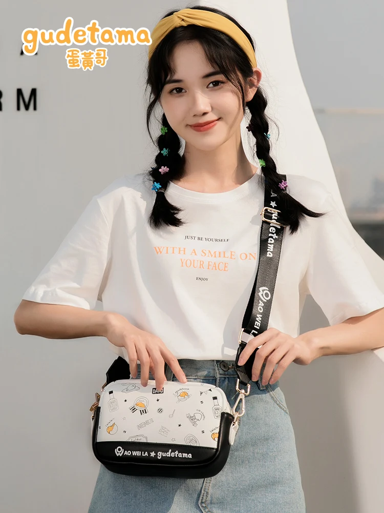 

Yolk brother joint shoulder bag casual messenger bag for men women Joker fashion small bag Japanese anime Western style handbag.