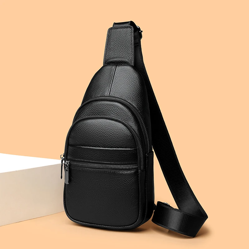 Stylish genuine leather sling bag for men with multiple compartments, ideal for everyday carry or travel