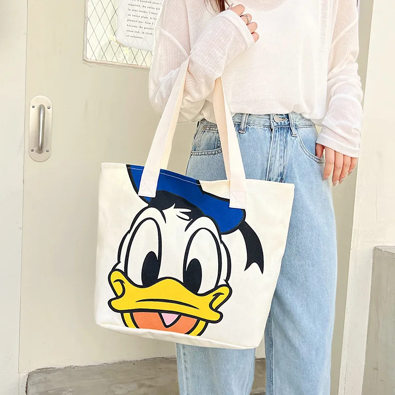 Disney Mickey Mouse Large Capacity Canvas Bag Female Cartoon Minnie One  Shoulder Donald Duck Daisy Handbag Student Tote Bag Gift - Shopping Bags -  AliExpress