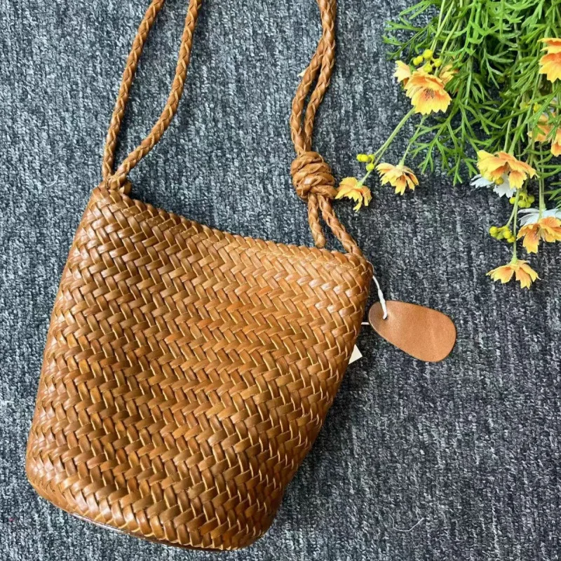 Hand-woven bag 2025 new French vintage vacation beach bag PU leather large capacity women's one-shoulder crossbody bucket bag