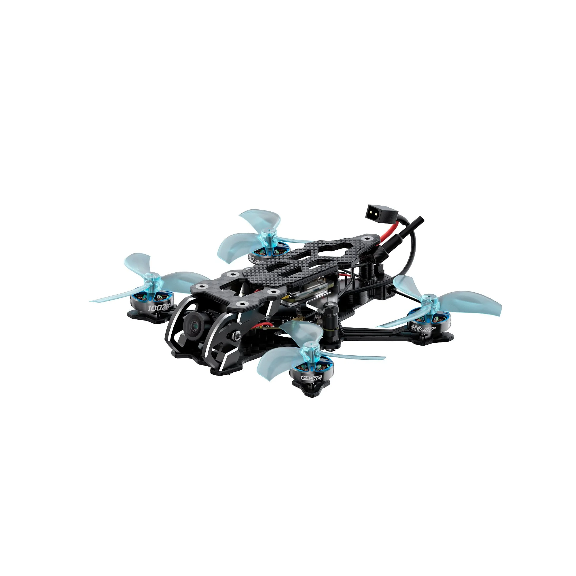 Drone FPV Cube18 Tinywhoop Analogique 1S en vol, avec un arrière-plan flou de paysage extérieur.