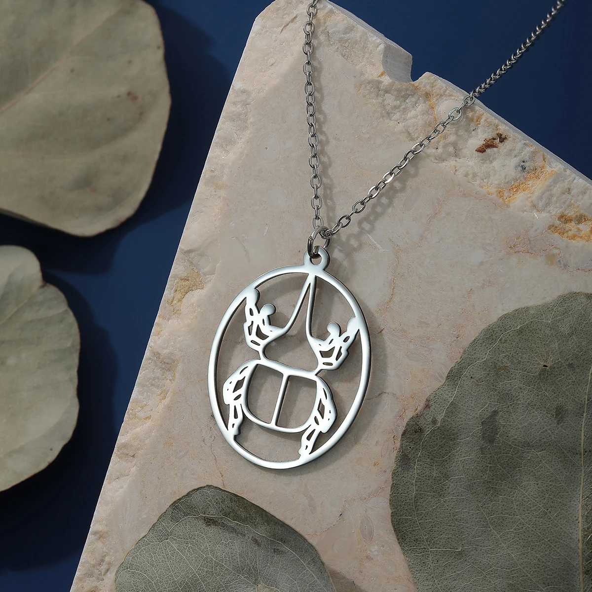 Chandler Stainless Steel Hercules Beetle Laser Cut Pendant Necklace Raw Brass Oval Insect Charms for Men and Women 5