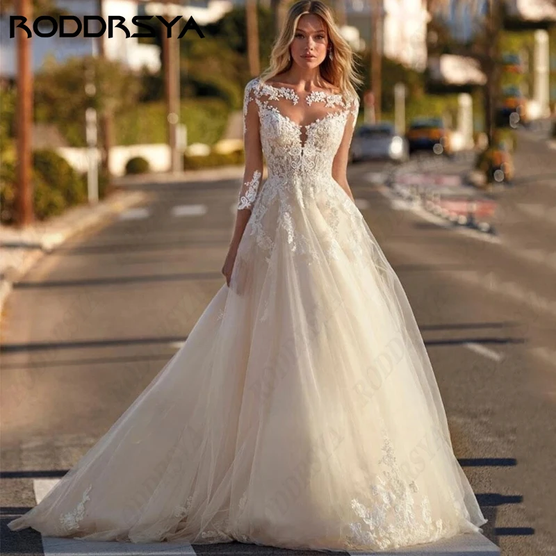 

RODDRSYA Elegant 3/4 Sleeve Wedding Dress for Woman Elegant Boat Neck Plus Size Appliques Vestido De Noiva Illusion Button Back