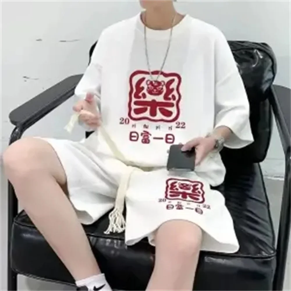 thumbnail image 1 of Nuevos conjuntos de pantalones cortos de moda de verano para hombre, chándales con gráficos de oso de anime, ropa deportiva de tendencia, trajes de 2 piezas, ropa de calle, conjuntos unisex, 1 of 5