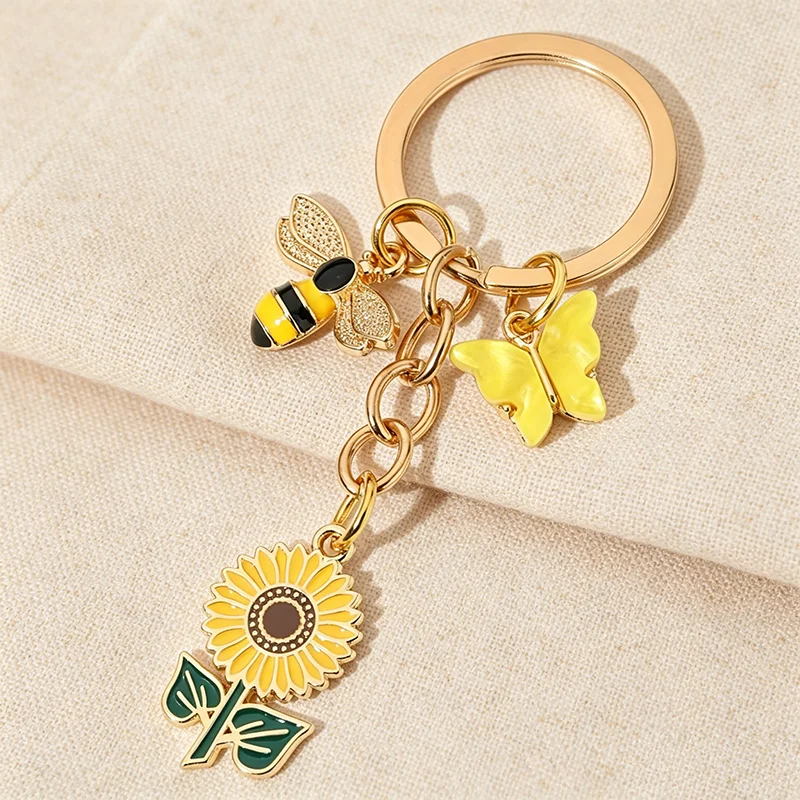 Sonnenblumen-Bienen-Schmetterling-Schlüsselanhänger, Vintage, handgefertigt, gelbes Harz, Emaille, Boho-Taschenblumen, Partygeschenk, Geschenk für Naturliebhaber