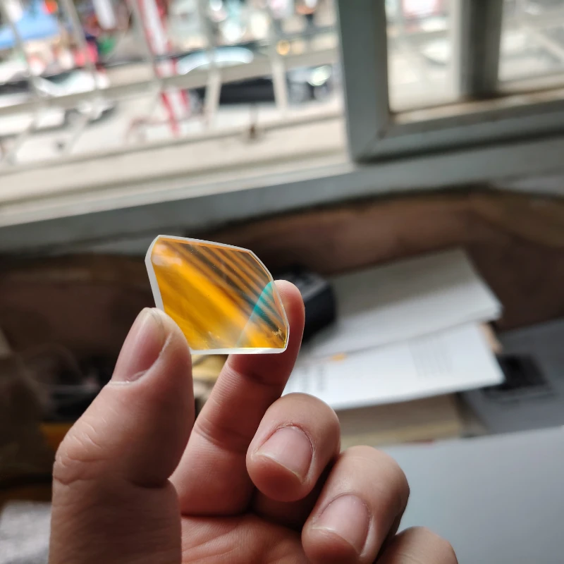 Description Picture 6 of item5Pcs Defective 30x39mm Concave-Convex  Lens Half Reflect Transmission Aspheric Laser Lens Beautiful Coating Prisms Stained Glass
