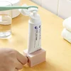 Toothpaste Squeezer Tooth Paste Holder Oral Care Bathroom Tools Tube Cosmetics Press Facial Cleanser Rolling Squeezing Dispenser 3